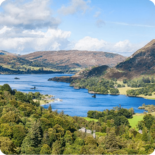 Scenic view of the Lake District, showcasing lush greenery and waters, ideal for UK tours and day trips.